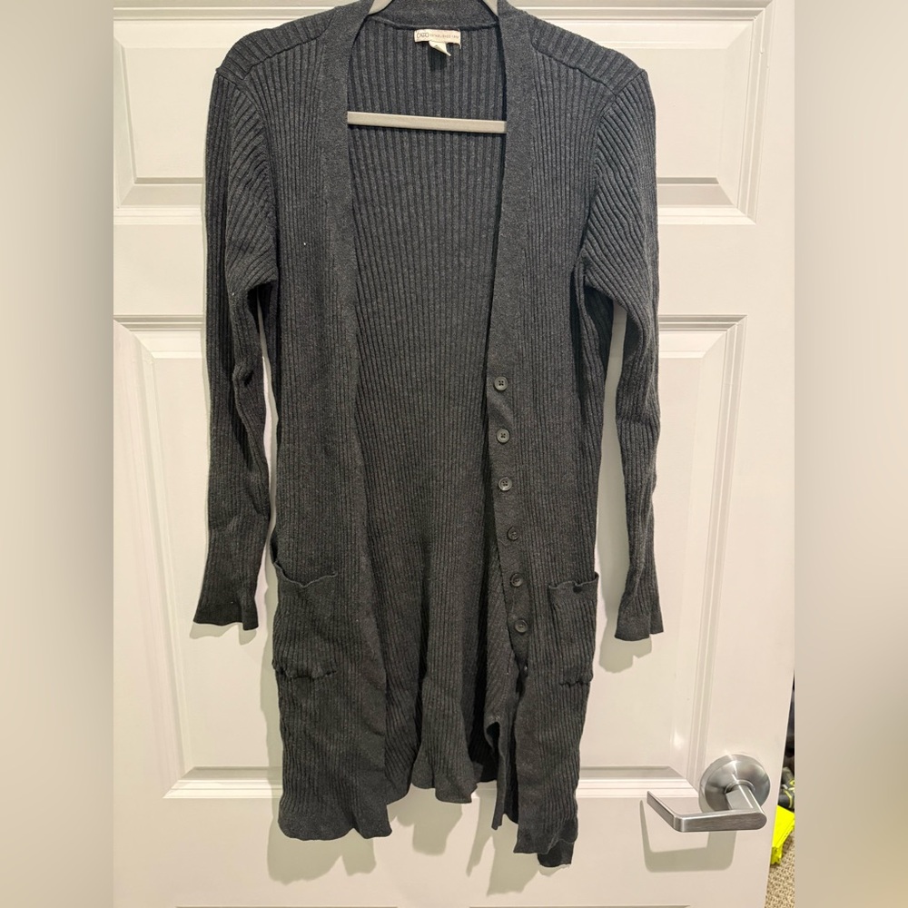 Long ribbed knit cardigan sweater.